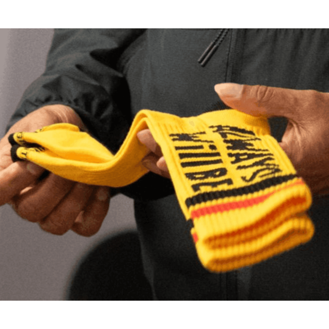 Person holding hand-knitted socks